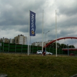 Modernizacja masztów na wersję z ramieniem eksponującym flagę NORAUTO Katowice